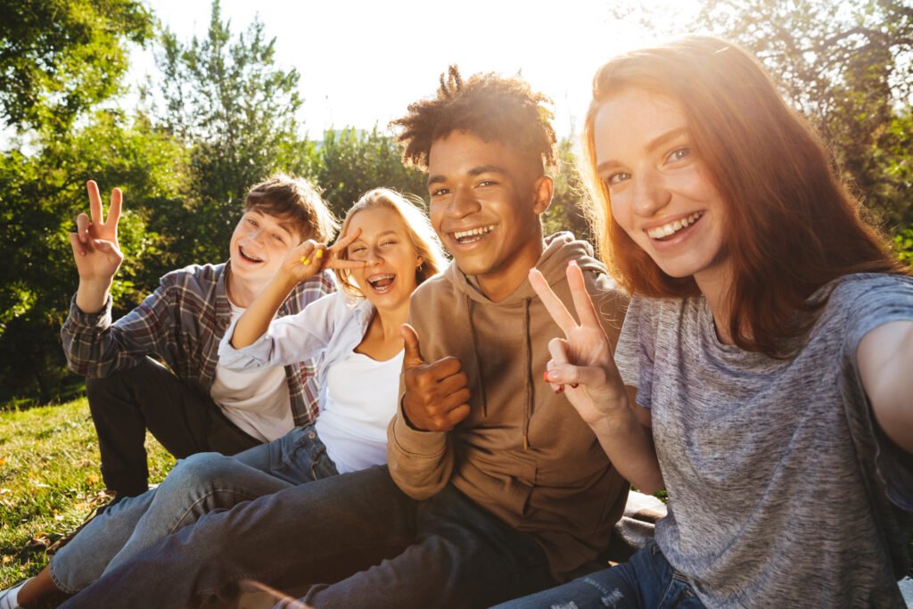 Group of excited students in summer