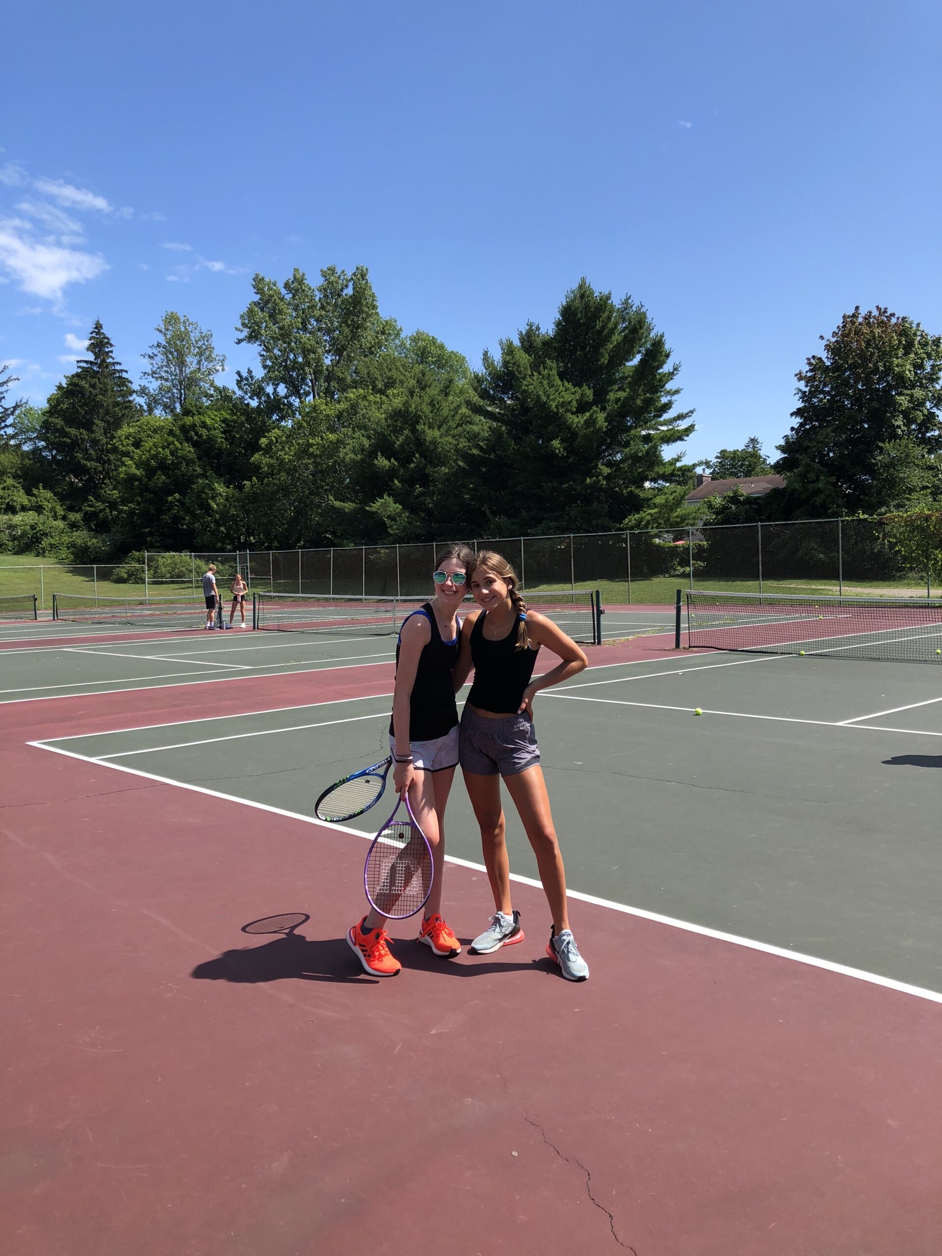 girls playing tennis