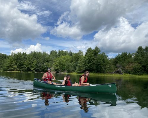 students canoeing during outdoor adventure