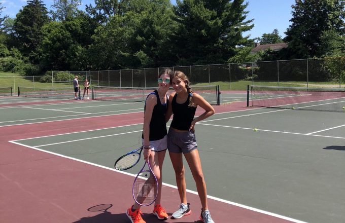 girls playing tennis