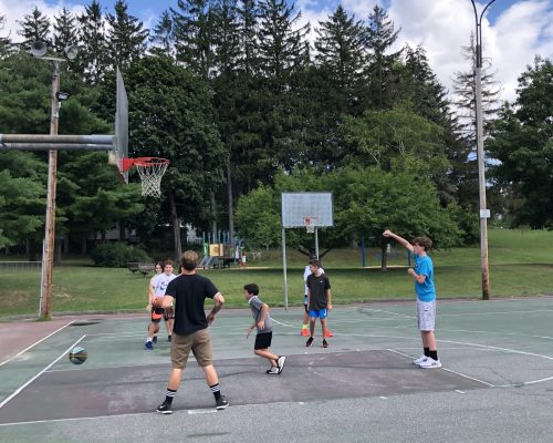 Students playing basketball at Burlington, Vermont Pre-College Summer Program