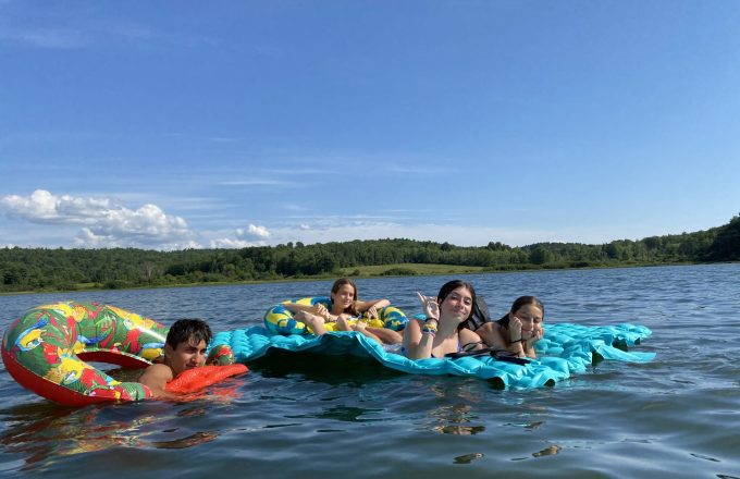students enjoying the lake