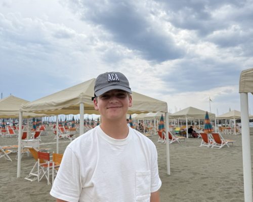 boy at beach viareggio italy