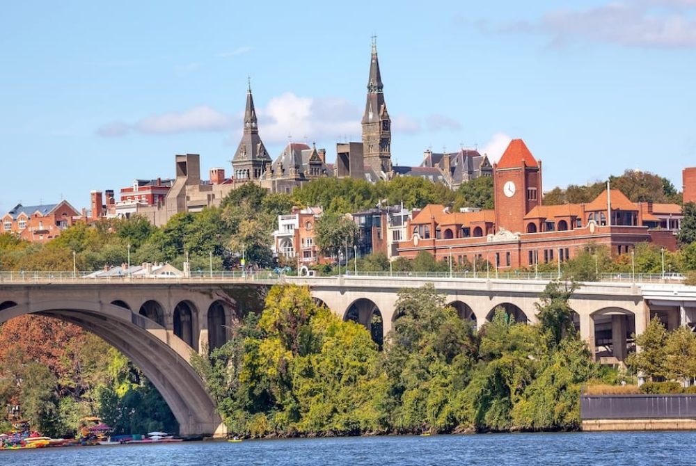 Key Bridge Potomac River Georgetown University Washington DC from Roosevelt Island.  Completed in 1923 this is the oldest bridge in Washington DC.