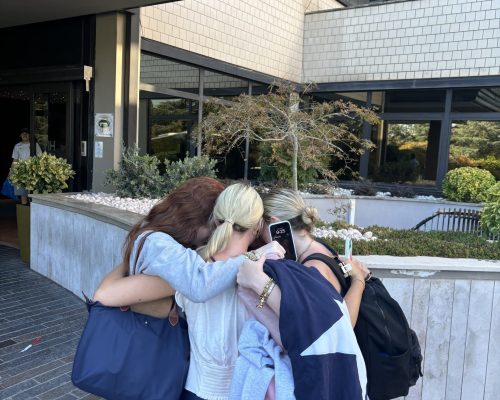 girls saying bye florence