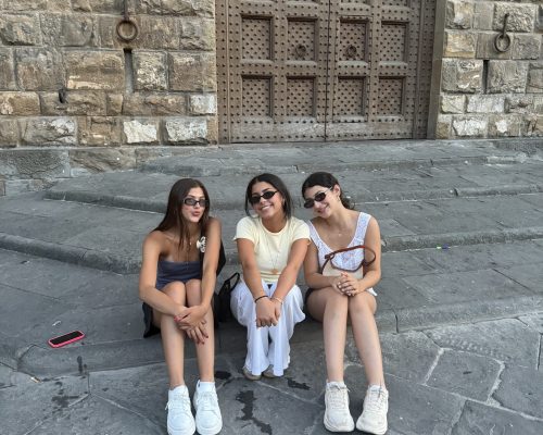 girls sitting florence