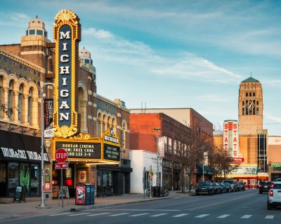 Liberty Street with the landmark Michigan Theater in downtown Ann Arbor, Michigan, USA in the evening.